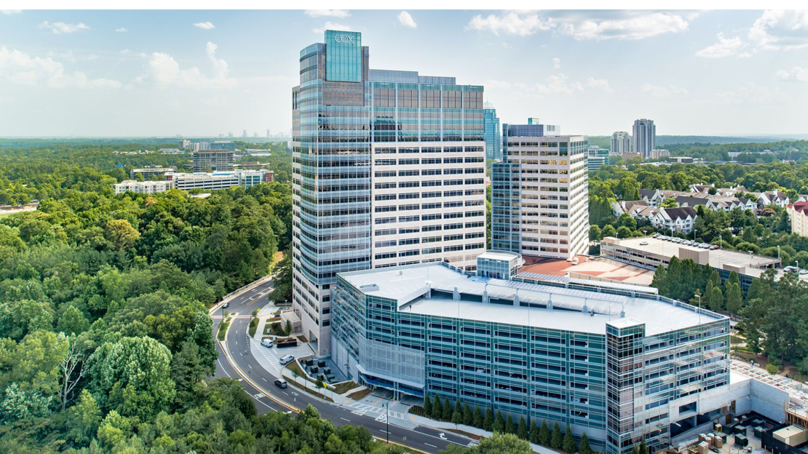 a large building with trees around it
