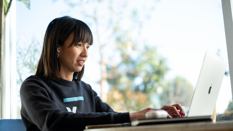 Cox employee on laptop