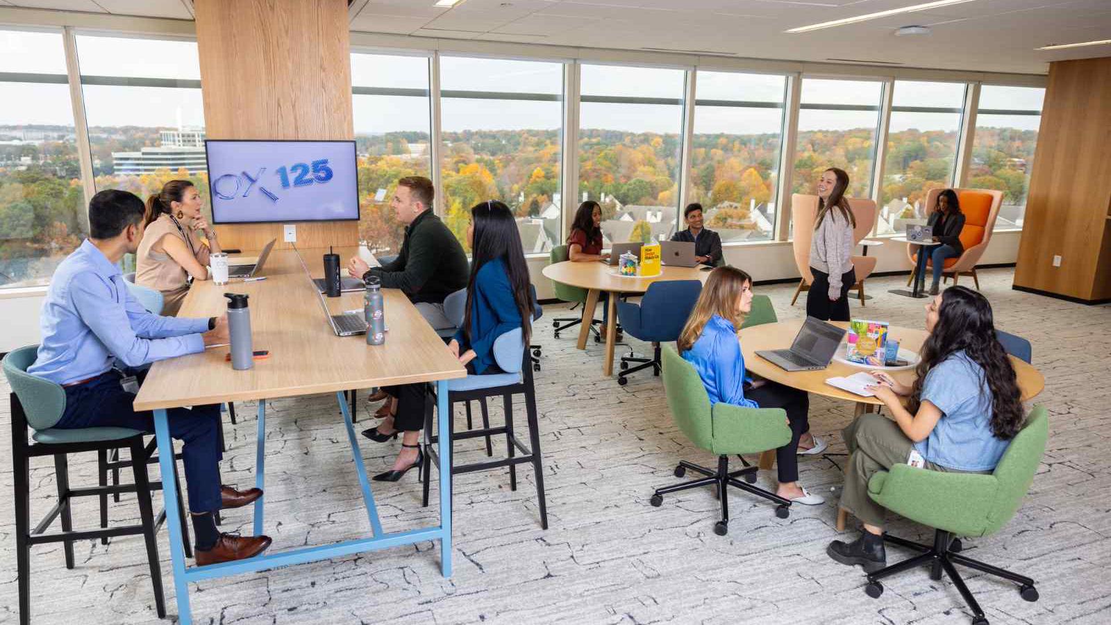 a group of Cox employees in a room