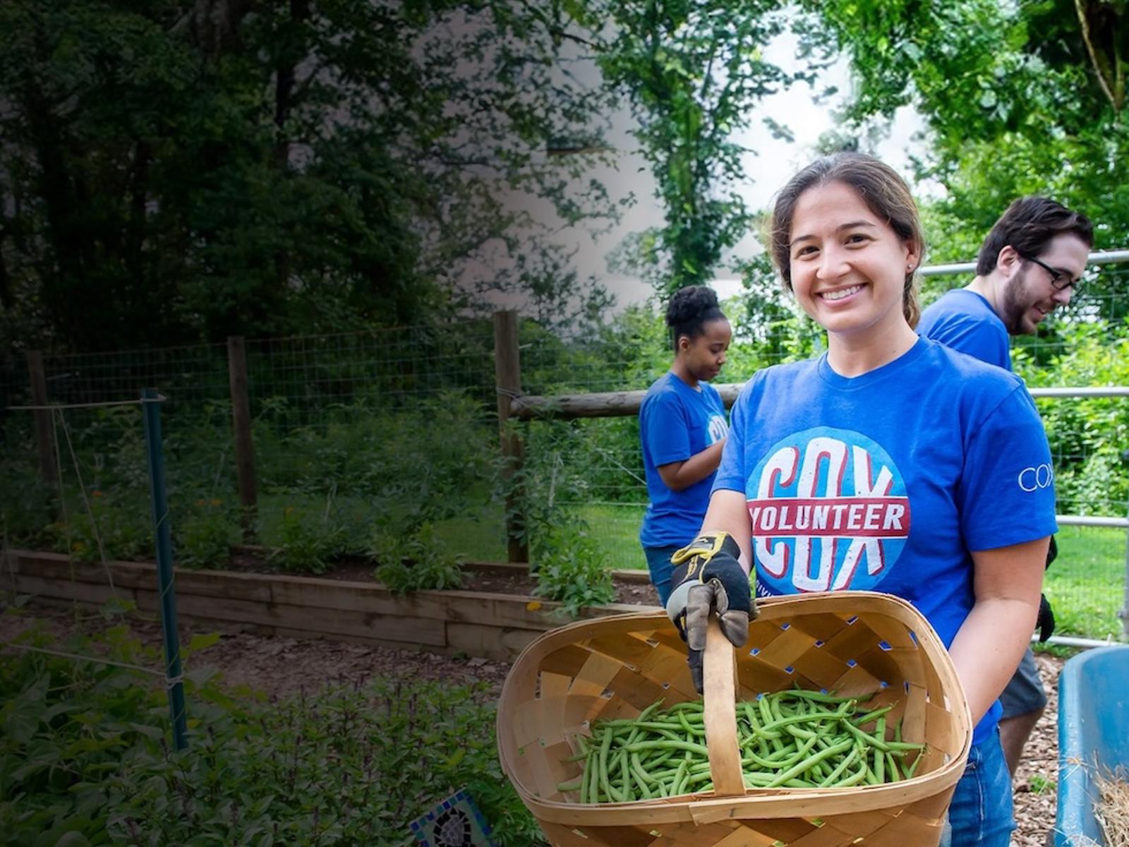 Cox Employee Volunteering In A Garden (2)