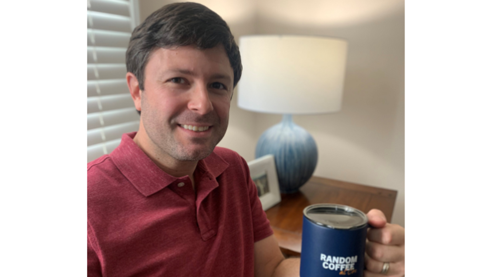 Chuck Prellwitz Cox employee with mug that says "Random Coffee"